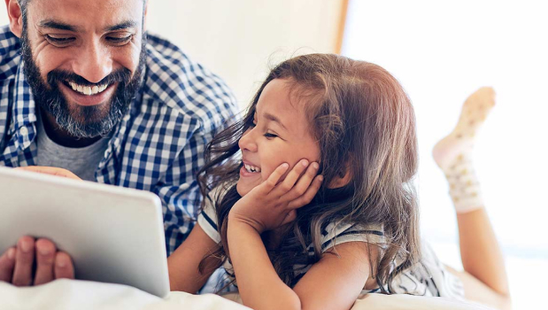 Dad and daughter with tablet