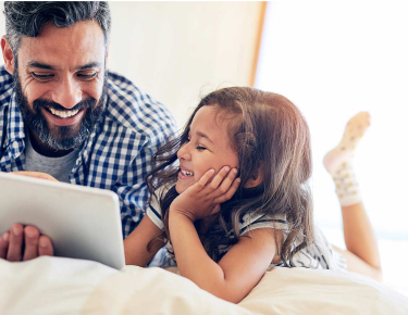 Dad and daughter with tablet